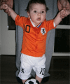 Voetbal outfit voor baby's.Oranje kleding